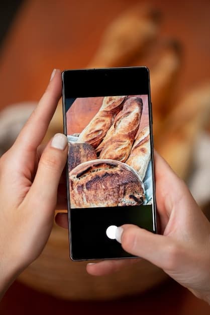 Hand scrolling Pinterest feed on mobile to find high-converting pins